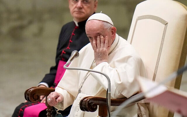 Pope Francis rubs his eye as he holds his weekly general audience in the Pope Paul VI hall at the Vatican, October 6, 2021. (AP Photo/Alessandra Tarantino) Pope Francis rubs his eye as he holds his weekly general audience in the Pope Paul VI hall at the Vatican, October 6, 2021. (AP Photo/Alessandra Tarantino)