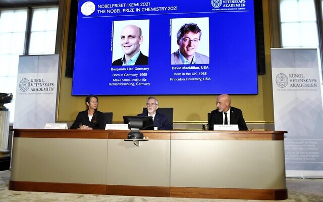 Goran K Hansson, Permanent Secretary of the Royal Swedish Academy of Sciences, centre, announces the winners of the 2021 Nobel Prize in Chemistry, in Stockholm, Sweden, October 6, 2021. (Claudio Bresciani/TT New Agency via AP) Goran K Hansson, Permanent Secretary of the Royal Swedish Academy of Sciences, centre, announces the winners of the 2021 Nobel Prize in Chemistry, in Stockholm, Sweden, October 6, 2021. (Claudio Bresciani/TT New Agency via AP)