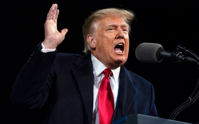 In this December 5, 2020 file photo, US President Donald Trump speaks at a campaign rally for Senate Republican candidates, in Valdosta, Georgia. (AP Photo/Evan Vucci, File)