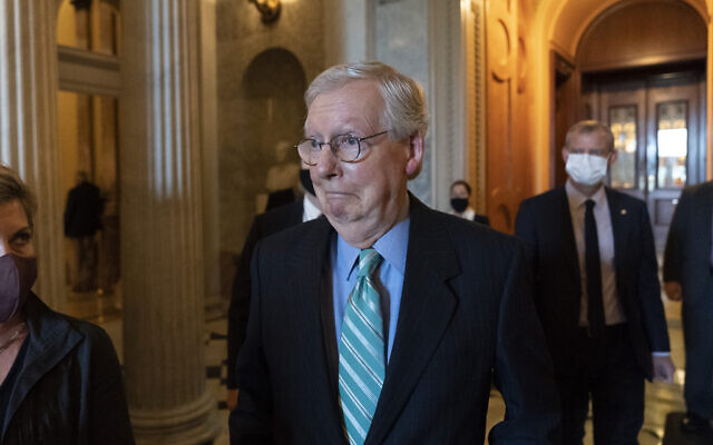 Senate Minority Leader Mitch McConnell of Kentucky, walks to a policy luncheon on Capitol Hill, Thursday, Oct. 7, 2021, in Washington. (Alex Brandon/AP) Senate Minority Leader Mitch McConnell of Kentucky, walks to a policy luncheon on Capitol Hill, Thursday, Oct. 7, 2021, in Washington. (Alex Brandon/AP)