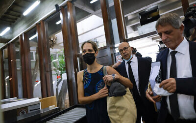 Aya Biran-Nirko, left, a paternal aunt of Eitan Biran, the boy who survived a cable car crash in Italy that killed his immediate family, arrives to court in Tel Aviv, October 8, 2021. (AP/Tsafrir Abayov) Aya Biran-Nirko, left, a paternal aunt of Eitan Biran, the boy who survived a cable car crash in Italy that killed his immediate family, arrives to court in Tel Aviv, October 8, 2021. (AP/Tsafrir Abayov)