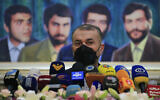 Iranian Foreign Minister Hossein Amir-Abdollahian speaks during a press conference in front of a painting of four missing Iranian diplomats who disappeared during the 1982 Israeli invasion of Lebanon, at the Iranian embassy, in Beirut, Lebanon, Friday, Oct. 8, 2021. (AP/Hussein Malla)