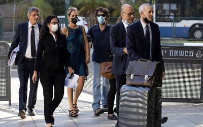 Aya Biran, third from left, a paternal aunt of Eitan Biran, who survived a cable car crash in Italy that killed his immediate family, arrives to court in Tel Aviv Friday, Oct. 8, 2021. ( AP Photo/Tsafrir Abayov)