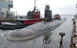 The USS Virginia returns to the Electric Boat Shipyard in Groton, Connecticut, after its first sea trials, July 30, 2004. (AP Photo/ Jack Sauer, File)
