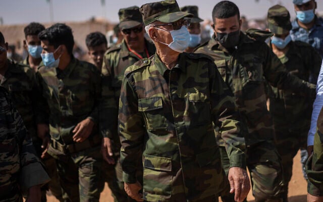 Brahim Ghali, head of the Polisario Front and the self-declared Sahrawi Democratic Arab Republic, center, attends a National Unity Day event in the Dajla refugee camp, Algeria, Tuesday, Oct. 12, 2021. (AP Photo/Bernat Armangue) Brahim Ghali, head of the Polisario Front and the self-declared Sahrawi Democratic Arab Republic, center, attends a National Unity Day event in the Dajla refugee camp, Algeria, Tuesday, Oct. 12, 2021. (AP Photo/Bernat Armangue)