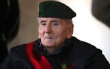 In this Nov.26, 2020 file photo, Hubert Germain, a WWII Resistance fighter and the last 'Compagnon de la Liberation' is pictured before a ceremony in homage to fellow Compagnon de la Liberation Daniel Cordier, at the Invalides monument in Paris (AP Photo/Michel Euler, Pool, File)