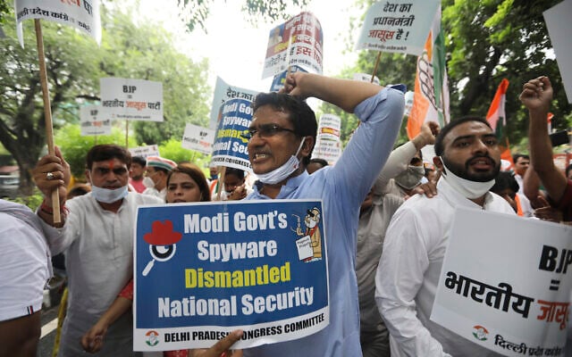 Congress party workers during a protest accusing Indian Prime Minister Narendra Modi's government of using military-grade spyware to monitor political opponents, journalists and activists in New Delhi, India, on July 20, 2021. (AP Photo/Manish Swarup, File) Congress party workers during a protest accusing Indian Prime Minister Narendra Modi's government of using military-grade spyware to monitor political opponents, journalists and activists in New Delhi, India, on July 20, 2021. (AP Photo/Manish Swarup, File)