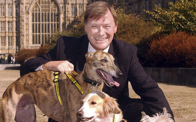 Conservative lawmaker David Amess outside the Houses of Parliament in Westminster, London on Sept. 17, 2003. Amess was stabbed to death on October 15, 2021, when meeting with his constituents. (John Stillwell/PA via AP) Conservative lawmaker David Amess outside the Houses of Parliament in Westminster, London on Sept. 17, 2003. Amess was stabbed to death on October 15, 2021, when meeting with his constituents. (John Stillwell/PA via AP)
