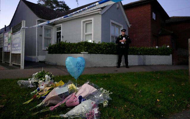Floral tributes are placed on one of the roads leading to the Belfairs Methodist Church in Eastwood Road North, where British Conservative lawmaker David Amess has died after being stabbed at a constituency surgery, in Leigh-on-Sea, Essex, England, Friday, Oct. 15, 2021. (AP/Kirsty Wigglesworth) Floral tributes are placed on one of the roads leading to the Belfairs Methodist Church in Eastwood Road North, where British Conservative lawmaker David Amess has died after being stabbed at a constituency surgery, in Leigh-on-Sea, Essex, England, Friday, Oct. 15, 2021. (AP/Kirsty Wigglesworth)