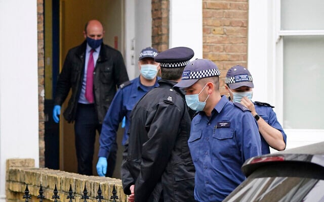 Police search a house believed to be in relation to the slaying of member of Parliament David Amess, in London, October 17, 2021. (Dominic Lipinski/PA via AP) Police search a house believed to be in relation to the slaying of member of Parliament David Amess, in London, October 17, 2021. (Dominic Lipinski/PA via AP)