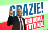 Center-left mayoral candidate Roberto Gualtieri flashes a v-sign at his party's headquarters in Rome, October 18, 2021. (Gregorio Borgia/AP)