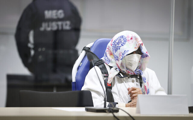 The 96-year-old defendant Irmgard F. sits in an ambulance chair behind a plexiglass screen in a courtroom in Itzehoe, Germany, Oct. 19, 2021 (Christian Charisius/DPA via AP, Pool) The 96-year-old defendant Irmgard F. sits in an ambulance chair behind a plexiglass screen in a courtroom in Itzehoe, Germany, Oct. 19, 2021 (Christian Charisius/DPA via AP, Pool)