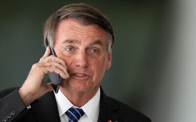 Brazilian President Jair Bolsonaro after meeting with Colombia's President Ivan Duque at Planalto presidential palace in Brasilia, Brazil, October 19, 2021. (AP Photo/Eraldo Peres)