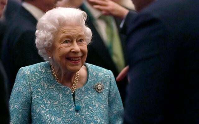 In this October 19, 2021 file photo Britain's Queen Elizabeth II and Prime Minister Boris Johnson, left, greet guests at a reception for the Global Investment Summit in Windsor Castle, Windsor, England (AP Photo/Alastair Grant, Pool, File) In this October 19, 2021 file photo Britain's Queen Elizabeth II and Prime Minister Boris Johnson, left, greet guests at a reception for the Global Investment Summit in Windsor Castle, Windsor, England (AP Photo/Alastair Grant, Pool, File)