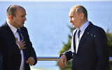 Russian President Vladimir Putin (right) and Prime Minister Naftali Bennett speak during their meeting in Sochi, Russia, on October 22, 2021. (Evgeny Biyatov, Sputnik, Kremlin Pool Photo via AP/ File)