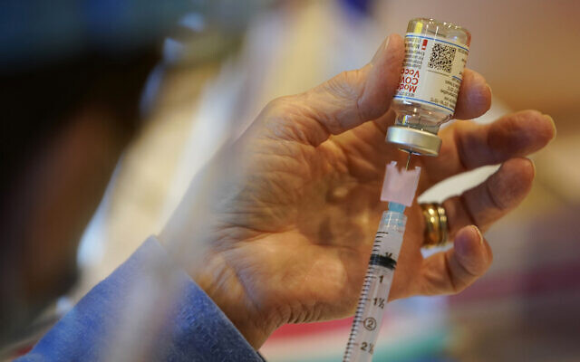 A Chester County, Pennsylvania, Health Department worker fills a syringe with Moderna COVID-19 vaccine, before administering it at the Chester County Government Services Center in West Chester, Pennsylvania, on December 29, 2020. (AP Photo/ Matt Slocum, File) A Chester County, Pennsylvania, Health Department worker fills a syringe with Moderna COVID-19 vaccine, before administering it at the Chester County Government Services Center in West Chester, Pennsylvania, on December 29, 2020. (AP Photo/ Matt Slocum, File)