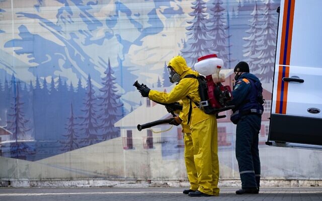 Employees of the Federal State Center for Special Risk Rescue Operations of Russia Emergency Situations prepare to disinfect Savyolovsky railway station in Moscow, Russia, October 26, 2021. (AP Photo/Alexander Zemlianichenko) Employees of the Federal State Center for Special Risk Rescue Operations of Russia Emergency Situations prepare to disinfect Savyolovsky railway station in Moscow, Russia, October 26, 2021. (AP Photo/Alexander Zemlianichenko)