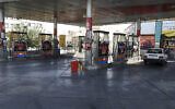 A gas station is seen standing empty because the pumps are out of service, in Tehran, Iran, on Tuesday, October 26, 2021. (AP Photo/Vahid Salemi)