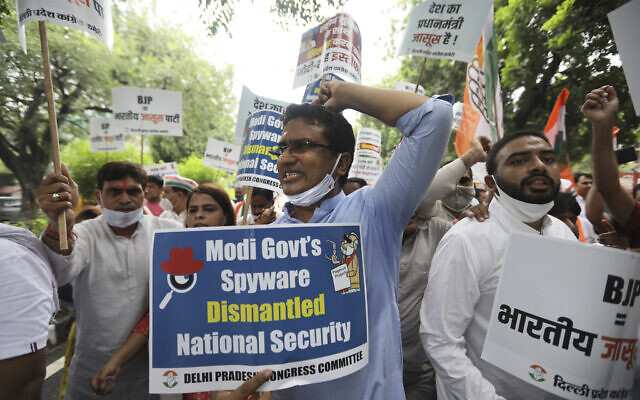 In this July 20, 2021 file photo, Congress party workers shout slogans during a protest accusing Prime Minister Narendra Modi's government of using military-grade spyware to monitor political opponents, journalists and activists in New Delhi, India. (AP Photo/Manish Swarup, File) In this July 20, 2021 file photo, Congress party workers shout slogans during a protest accusing Prime Minister Narendra Modi's government of using military-grade spyware to monitor political opponents, journalists and activists in New Delhi, India. (AP Photo/Manish Swarup, File)