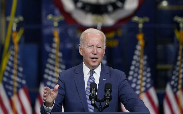 US President Joe Biden speaks at NJ Transit Meadowlands Maintenance Complex to promote his economic agenda in Kearny, New Jersey, October 25, 2021. (AP Photo/Evan Vucci) US President Joe Biden speaks at NJ Transit Meadowlands Maintenance Complex to promote his economic agenda in Kearny, New Jersey, October 25, 2021. (AP Photo/Evan Vucci)