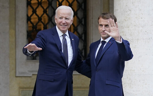 US President Joe Biden, left, and French President Emmanuel Macron wave prior to a meeting at La Villa Bonaparte in Rome on Oct. 29, 2021. (AP Photo/Evan Vucci) US President Joe Biden, left, and French President Emmanuel Macron wave prior to a meeting at La Villa Bonaparte in Rome on Oct. 29, 2021. (AP Photo/Evan Vucci)