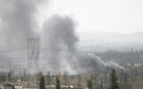 Smoke rises in the countryside of Damascus, Syria, on October 30, 2021, following what Syrian state media said was an Israeli strike. (AP Photo/Omar Sanadiki)