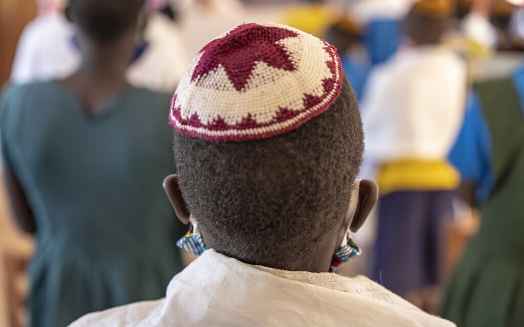 A member of the Nasenyi synagogue wears a kippah and a facemask against coronavirus transmission. (Courtesy of the Nasenyi congregation)