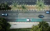 An illustrative image showing an electric car charging while in motion using wireless charging infrastructure tech by Electreon. (Electreon)