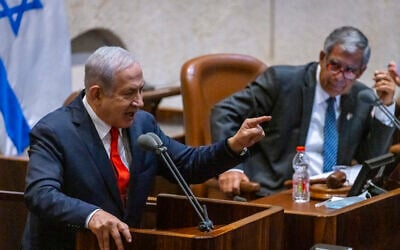 Opposition leader Benjamin Netanyahu speaking in the Knesset plenum alongside Knesset Speaker Miki Levy on July 12, 2021. (Olivier Fitoussi/Flash90)