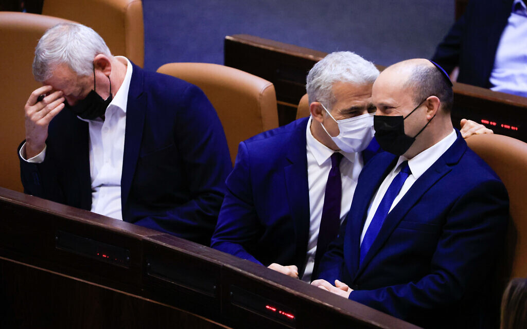 Prime Minister Naftali Bennett (right), Foreign Minister Yair Lapid (center) and Defense Minister Benny Gantz at the Knesset, on September 2, 2021. (Olivier Fitoussi/Flash90) Prime Minister Naftali Bennett (right), Foreign Minister Yair Lapid (center) and Defense Minister Benny Gantz at the Knesset, on September 2, 2021. (Olivier Fitoussi/Flash90)