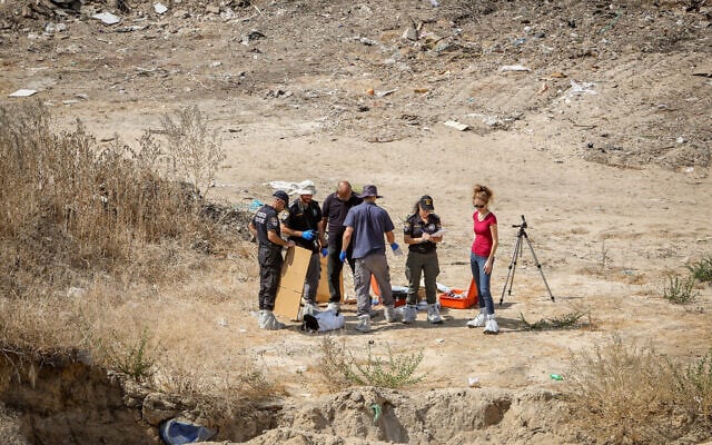 Police at the scene where the body of 17-year-old Lital Yael Melnik was found, on a construction site, in Kiryat Motzkin, October 2, 2021. (Alon Nadav/Flash90) Police at the scene where the body of 17-year-old Lital Yael Melnik was found, on a construction site, in Kiryat Motzkin, October 2, 2021. (Alon Nadav/Flash90)