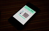 Illustrative. The 'Green Pass' seen in Jerusalem, October 3, 2021. (Yonatan Sindel/Flash90)