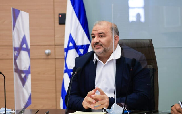 Mansour Abbas, head of the Ra'am party, leads a faction meeting, in the Israeli parliament on October 4, 2021. (Olivier Fitoussi/Flash90) Mansour Abbas, head of the Ra'am party, leads a faction meeting, in the Israeli parliament on October 4, 2021. (Olivier Fitoussi/Flash90)