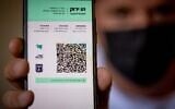 Illustration of the new Green Pass, in Jerusalem, on October 4, 2021. (Yonatan Sindel/Flash90)