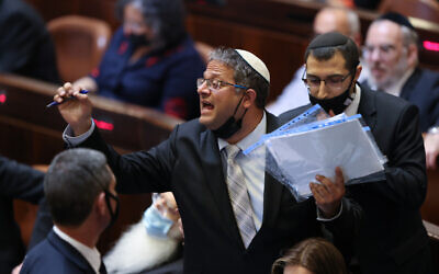 MK Itamar Ben Gvir shouts at then-Prime Minister Naftali Bennett during a plenum session in the Knesset on October 11, 2021. (Yonatan Sindel/Flash90)