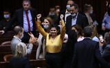 New Hope MK Sharren Haskel, center, seen during a vote on a law proposing reforms regulating medical marijuana, held in the Knesset, in Jerusalem, on October13, 2021. (Yonatan Sindel/Flash90)