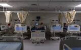 Empty beds are seen in the intensive care unit at the coronavirus ward of Shaare Zedek hospital in Jerusalem on October 14, 2021. (Olivier Fitoussi/Flash90)