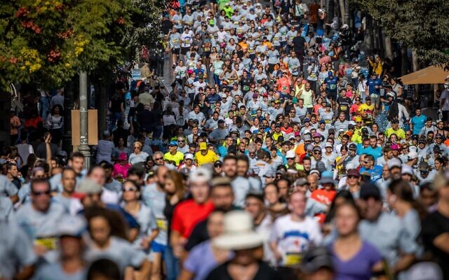 Thousands of runners take part in the annual marathon in Jerusalem, October 29, 2021. (Yonatan Sindel/Flash90) Thousands of runners take part in the annual marathon in Jerusalem, October 29, 2021. (Yonatan Sindel/Flash90)