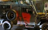 A Border Police vehicle is seen after it was attacked with stones and buckets of paint, near Yitzhar in the West Bank, on October 11, 2021. (Israel Police)