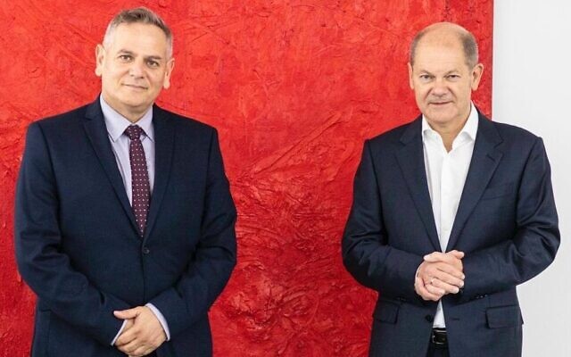 Health Minister Nitzan Horowitz (left) meets with German Finance Minister Olaf Scholz in Berlin, October 27, 2021 (Via Twitter) Health Minister Nitzan Horowitz (left) meets with German Finance Minister Olaf Scholz in Berlin, October 27, 2021 (Via Twitter)