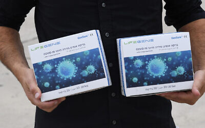 Some of the millions of coronavirus antigen testing kits that arrived in Israel on October 12, 2021. (Haim Zach / GPO)
