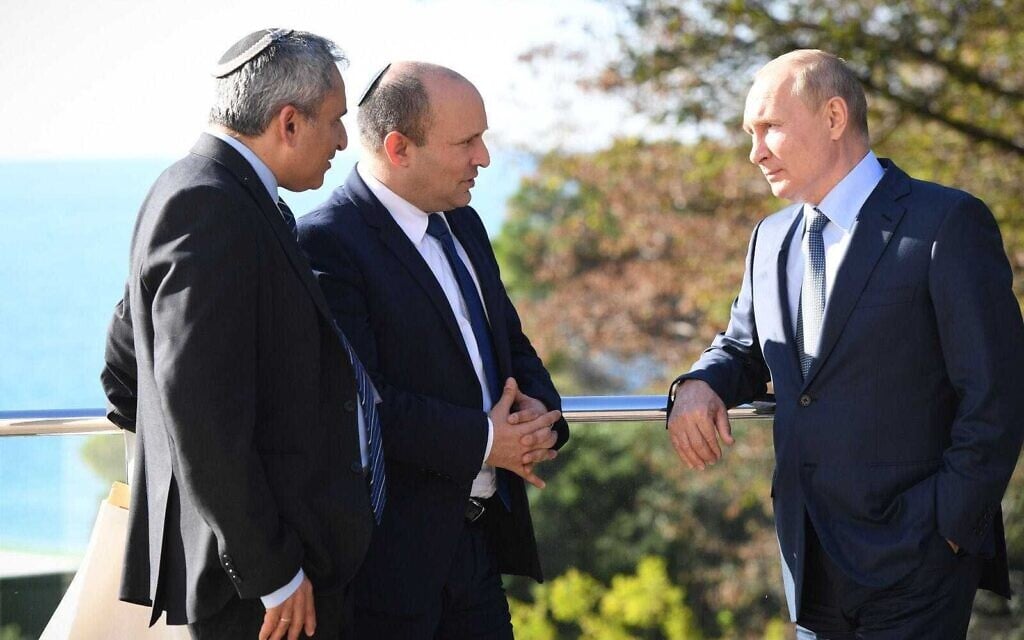 Prime Minister Naftali Bennett (C) speaks with Russian President Vladimir Putin (R) while accompanied by Housing Minister Ze’ev Elkin who acted as a translator at Putin's residence in Sochi, Russia on October 22, 2021. (Kobi Gidon/GPO) Prime Minister Naftali Bennett (C) speaks with Russian President Vladimir Putin (R) while accompanied by Housing Minister Ze’ev Elkin who acted as a translator at Putin's residence in Sochi, Russia on October 22, 2021. (Kobi Gidon/GPO)