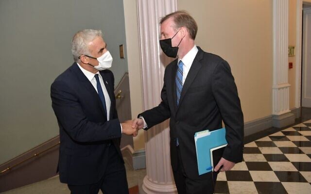 File: Then-foreign minister Yair Lapid meets with US National Security Adviser Jake Sullivan in Washington, DC, on October 12, 2021. (Shlomi Amsalem/Courtesy) File: Then-foreign minister Yair Lapid meets with US National Security Adviser Jake Sullivan in Washington, DC, on October 12, 2021. (Shlomi Amsalem/Courtesy)