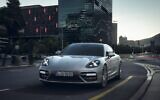 An illustrative photo of a Porsche (Panamera Turbo S-E Hybrid Executive) on a city street. (Porsche)