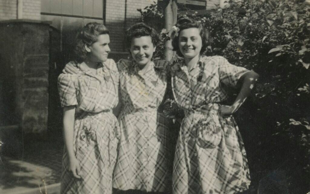 From left to right, Rene, Lily, and Piri wear matching dresses in Germany in the spring of 1945 after their liberation by the United States Army. (Courtesy)