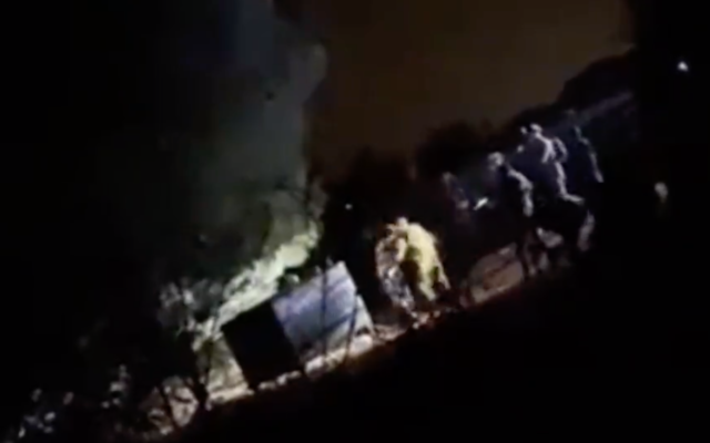 IDF soldiers arrest a Lebanese civilian near Metula after he illegally crossed into Israel on October 29, 2021. (Screen capture/YouTube) IDF soldiers arrest a Lebanese civilian near Metula after he illegally crossed into Israel on October 29, 2021. (Screen capture/YouTube)