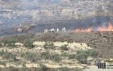 Israeli settlers clash with Palestinians near the West Bank town of Burin on Saturday, on October 16, 2021. (Yesh Din)