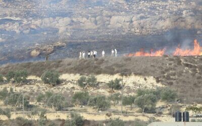 Israeli settlers clash with Palestinians near the West Bank town of Burin on Saturday, on October 16, 2021. (Yesh Din)