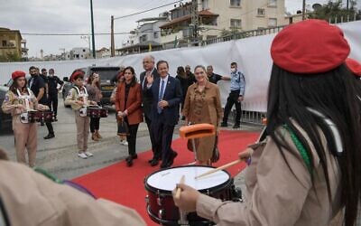 President Isaac Herzog and the First Lady are welcomed at a school in Taibe, October 31, 2021. (Kobi Gideon/GPO)