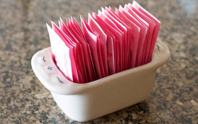 Illustrative: A container holding packets of artificial sweetener (BigRedCurlyGuy; iStock by Getty Images) Illustrative: A container holding packets of artificial sweetener (BigRedCurlyGuy; iStock by Getty Images)